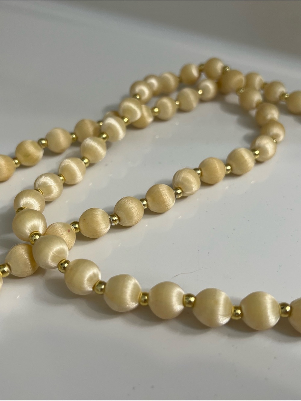 Elegant Cream Beaded Necklace with Gold Accents